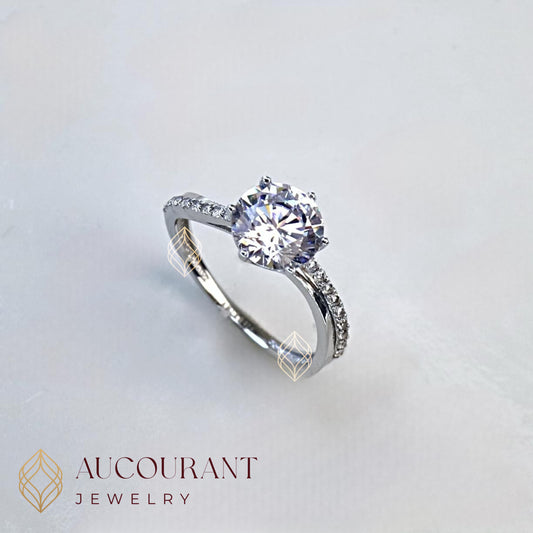 Cincin Emas CW Model Solitaire melingkar miring AD R. Emas White Gold 17K.